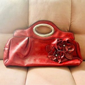 Nicole Miller Red Flowers Vegan Leather Clutch.